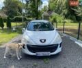 Белый Пежо 308, объемом двигателя 1.4 л и пробегом 205 тыс. км за 3950 $, фото 1 на Automoto.ua
