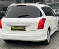 Белый Пежо 308, объемом двигателя 2 л и пробегом 273 тыс. км за 5800 $, фото 6 на Automoto.ua