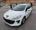 Белый Пежо 308, объемом двигателя 1.56 л и пробегом 124 тыс. км за 5400 $, фото 1 на Automoto.ua