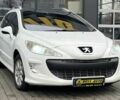 Белый Пежо 308, объемом двигателя 2 л и пробегом 273 тыс. км за 5800 $, фото 1 на Automoto.ua
