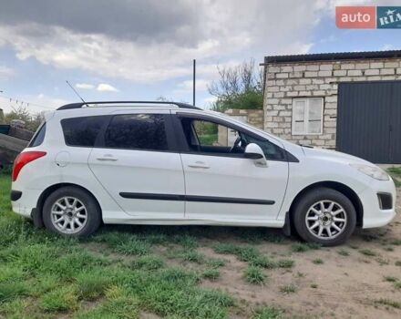 Белый Пежо 308, объемом двигателя 1.6 л и пробегом 260 тыс. км за 5200 $, фото 6 на Automoto.ua
