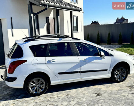 Белый Пежо 308, объемом двигателя 1.6 л и пробегом 220 тыс. км за 5500 $, фото 12 на Automoto.ua