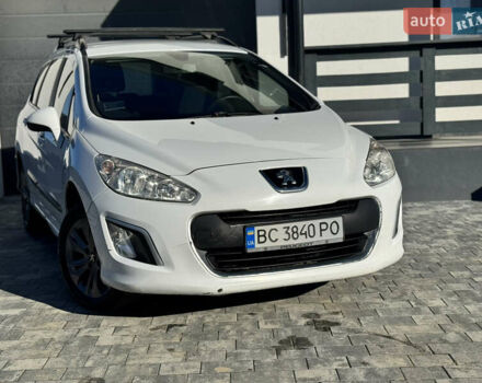 Белый Пежо 308, объемом двигателя 1.6 л и пробегом 220 тыс. км за 5500 $, фото 5 на Automoto.ua