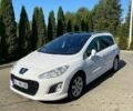 Белый Пежо 308, объемом двигателя 2 л и пробегом 200 тыс. км за 8600 $, фото 1 на Automoto.ua