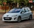 Белый Пежо 308, объемом двигателя 1.6 л и пробегом 250 тыс. км за 7800 $, фото 1 на Automoto.ua
