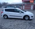 Белый Пежо 308, объемом двигателя 1.4 л и пробегом 237 тыс. км за 5800 $, фото 1 на Automoto.ua