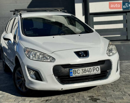 Белый Пежо 308, объемом двигателя 1.6 л и пробегом 220 тыс. км за 5500 $, фото 4 на Automoto.ua