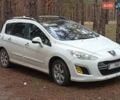 Белый Пежо 308, объемом двигателя 1.61 л и пробегом 230 тыс. км за 6600 $, фото 1 на Automoto.ua