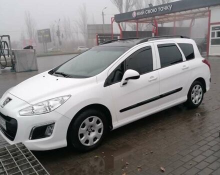Белый Пежо 308, объемом двигателя 1.56 л и пробегом 217 тыс. км за 6000 $, фото 1 на Automoto.ua