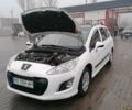Белый Пежо 308, объемом двигателя 1.56 л и пробегом 217 тыс. км за 6000 $, фото 2 на Automoto.ua