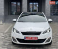 Белый Пежо 308, объемом двигателя 2 л и пробегом 234 тыс. км за 11777 $, фото 2 на Automoto.ua