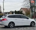 Белый Пежо 308, объемом двигателя 2 л и пробегом 234 тыс. км за 11650 $, фото 20 на Automoto.ua