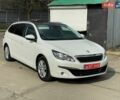 Белый Пежо 308, объемом двигателя 2 л и пробегом 232 тыс. км за 9700 $, фото 1 на Automoto.ua