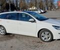 Белый Пежо 308, объемом двигателя 1.59 л и пробегом 171 тыс. км за 9800 $, фото 1 на Automoto.ua