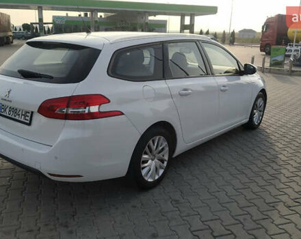 Белый Пежо 308, объемом двигателя 1.2 л и пробегом 141 тыс. км за 9600 $, фото 4 на Automoto.ua
