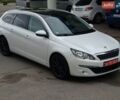 Белый Пежо 308, объемом двигателя 1.6 л и пробегом 220 тыс. км за 9699 $, фото 1 на Automoto.ua