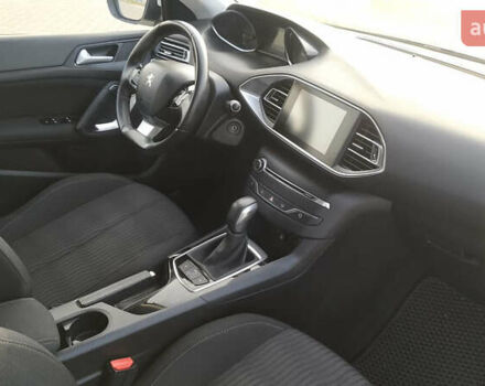 Белый Пежо 308, объемом двигателя 1.2 л и пробегом 141 тыс. км за 9600 $, фото 14 на Automoto.ua