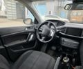 Белый Пежо 308, объемом двигателя 1 л и пробегом 230 тыс. км за 6500 $, фото 2 на Automoto.ua
