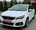 Белый Пежо 308, объемом двигателя 1.5 л и пробегом 190 тыс. км за 12299 $, фото 1 на Automoto.ua