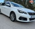 Белый Пежо 308, объемом двигателя 1.5 л и пробегом 143 тыс. км за 12800 $, фото 1 на Automoto.ua