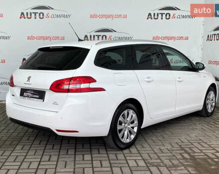 Белый Пежо 308, объемом двигателя 1.5 л и пробегом 162 тыс. км за 13650 $, фото 2 на Automoto.ua