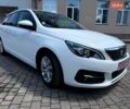 Білий Пежо 308, об'ємом двигуна 1.5 л та пробігом 210 тис. км за 11799 $, фото 1 на Automoto.ua