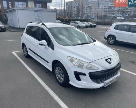 Белый Пежо 308, объемом двигателя 1.4 л и пробегом 241 тыс. км за 4199 $, фото 1 на Automoto.ua