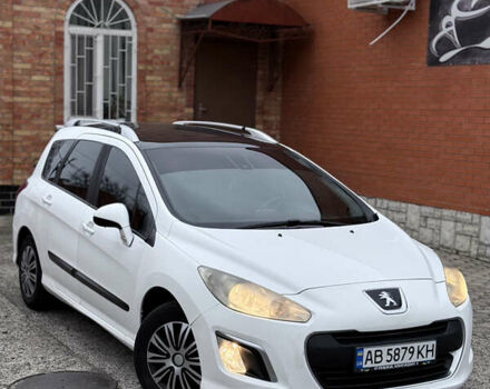 Белый Пежо 308, объемом двигателя 1.56 л и пробегом 234 тыс. км за 5900 $, фото 1 на Automoto.ua