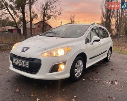 Белый Пежо 308, объемом двигателя 1.6 л и пробегом 224 тыс. км за 3900 $, фото 1 на Automoto.ua