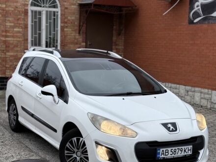 Белый Пежо 308, объемом двигателя 1.6 л и пробегом 234 тыс. км за 5900 $, фото 1 на Automoto.ua