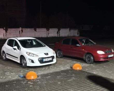 Белый Пежо 308, объемом двигателя 1.6 л и пробегом 289 тыс. км за 6000 $, фото 1 на Automoto.ua