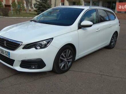 Білий Пежо 308, об'ємом двигуна 1.5 л та пробігом 220 тис. км за 10990 $, фото 1 на Automoto.ua