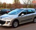 Бежевый Пежо 308, объемом двигателя 1.6 л и пробегом 176 тыс. км за 6400 $, фото 1 на Automoto.ua