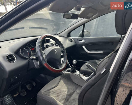 Черный Пежо 308, объемом двигателя 1.6 л и пробегом 260 тыс. км за 4600 $, фото 10 на Automoto.ua