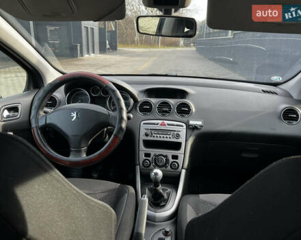 Черный Пежо 308, объемом двигателя 1.6 л и пробегом 260 тыс. км за 4600 $, фото 15 на Automoto.ua