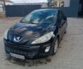 Черный Пежо 308, объемом двигателя 1.6 л и пробегом 240 тыс. км за 6200 $, фото 1 на Automoto.ua
