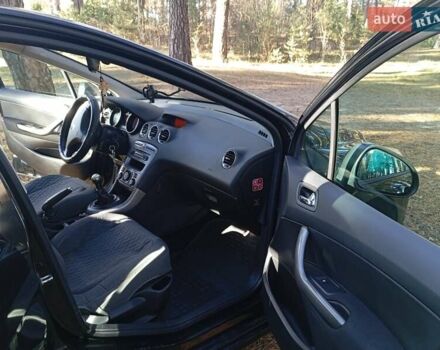 Черный Пежо 308, объемом двигателя 1.6 л и пробегом 335 тыс. км за 4900 $, фото 5 на Automoto.ua