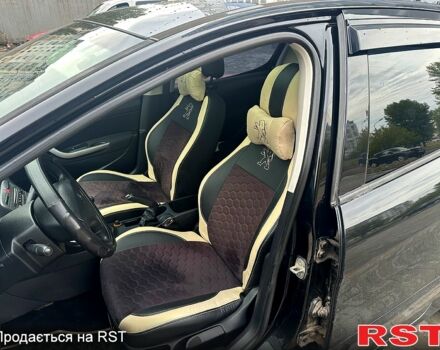 Черный Пежо 308, объемом двигателя 1.6 л и пробегом 226 тыс. км за 5500 $, фото 5 на Automoto.ua