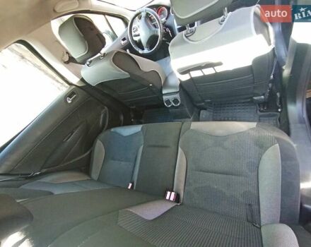 Черный Пежо 308, объемом двигателя 1.6 л и пробегом 335 тыс. км за 4900 $, фото 11 на Automoto.ua