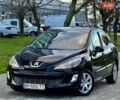 Черный Пежо 308, объемом двигателя 1.6 л и пробегом 166 тыс. км за 5400 $, фото 15 на Automoto.ua