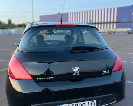Черный Пежо 308, объемом двигателя 1.6 л и пробегом 207 тыс. км за 6000 $, фото 6 на Automoto.ua