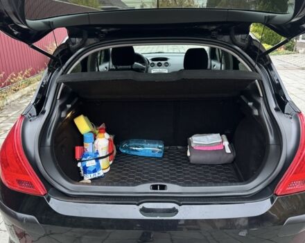 Черный Пежо 308, объемом двигателя 1.6 л и пробегом 157 тыс. км за 5200 $, фото 16 на Automoto.ua