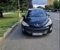 Чорний Пежо 308, об'ємом двигуна 2 л та пробігом 180 тис. км за 6500 $, фото 1 на Automoto.ua