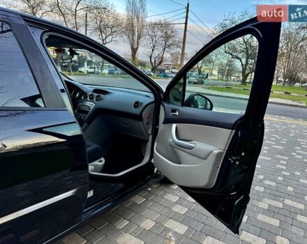 Черный Пежо 308, объемом двигателя 1.6 л и пробегом 166 тыс. км за 5400 $, фото 38 на Automoto.ua