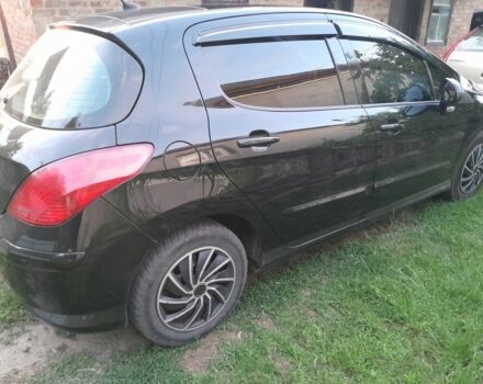 Чорний Пежо 308, об'ємом двигуна 1.6 л та пробігом 220 тис. км за 4100 $, фото 4 на Automoto.ua