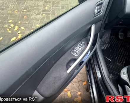 Чорний Пежо 308, об'ємом двигуна 1.6 л та пробігом 270 тис. км за 4900 $, фото 7 на Automoto.ua