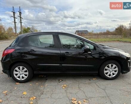 Черный Пежо 308, объемом двигателя 1.56 л и пробегом 320 тыс. км за 5300 $, фото 6 на Automoto.ua