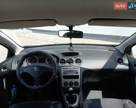 Чорний Пежо 308, об'ємом двигуна 1.6 л та пробігом 320 тис. км за 6429 $, фото 2 на Automoto.ua