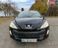 Черный Пежо 308, объемом двигателя 1.56 л и пробегом 320 тыс. км за 5300 $, фото 1 на Automoto.ua