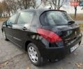 Черный Пежо 308, объемом двигателя 1.56 л и пробегом 320 тыс. км за 5300 $, фото 3 на Automoto.ua